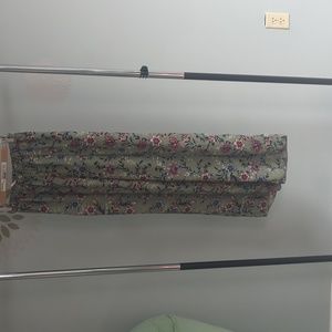 Long pants with slits long enough to make shorts green floral pattern